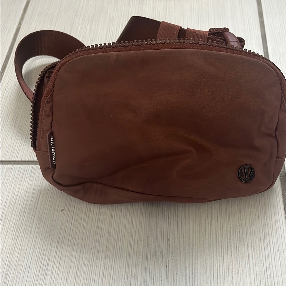 lululemon athletica Brown Mini Bag with Leather Material and Zipper Closure